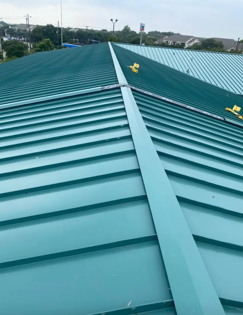Green commercial metal roof ridge and valley for Metal Roof Repair in Halfmoon